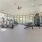 Fitness center with ample machines and natural light