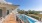 Large outdoor porch overlooking pool