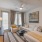 living room area with chair and sofa  in a room with a window